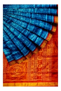 Sky and orange - red colour handwoven tissue silk saree