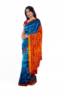 Sky and orange - red colour handwoven tissue silk saree